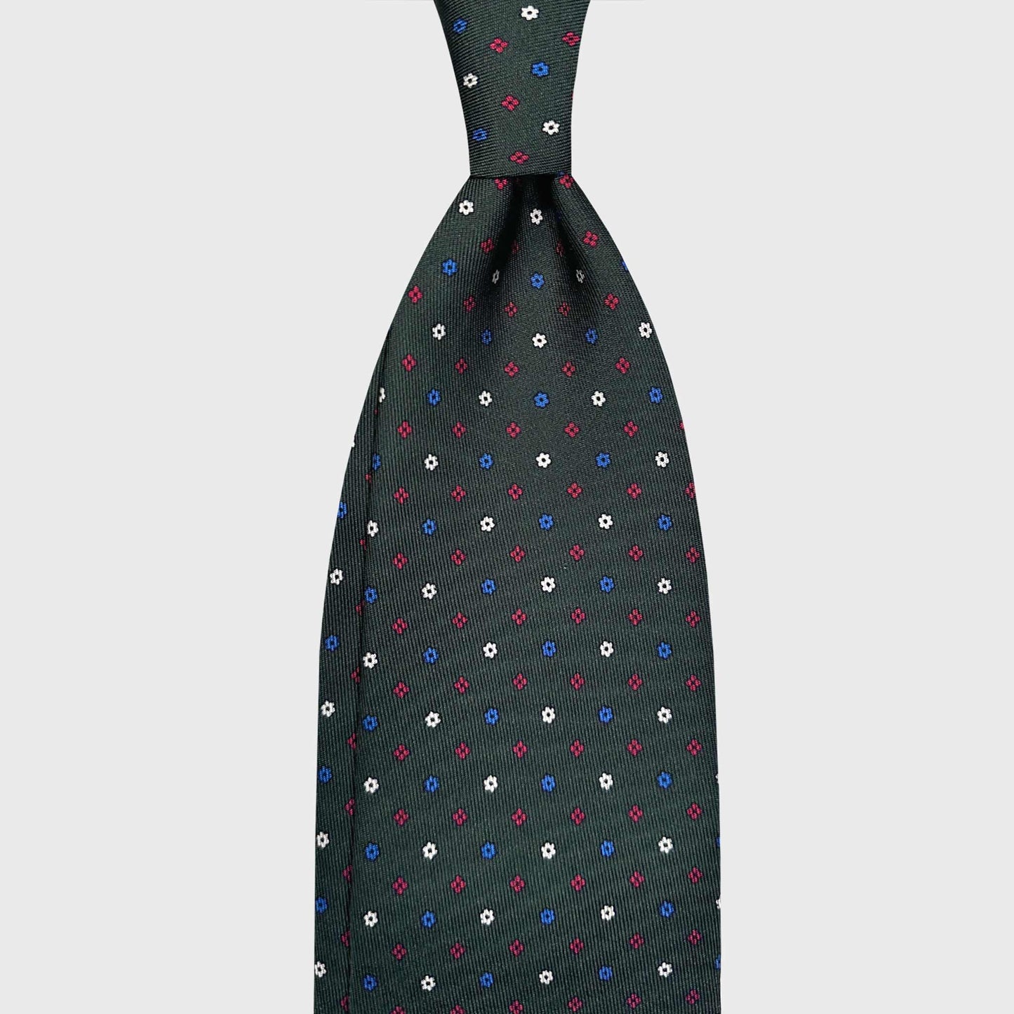 Forest Green Silk Tie Classic Floral Micro Fantasy Pattern. Hand made green tie, white red sky blue, floral micro fantasy pattern, made in Italy sartorial ties f marino napoli for Wools Boutique Uomo Genève