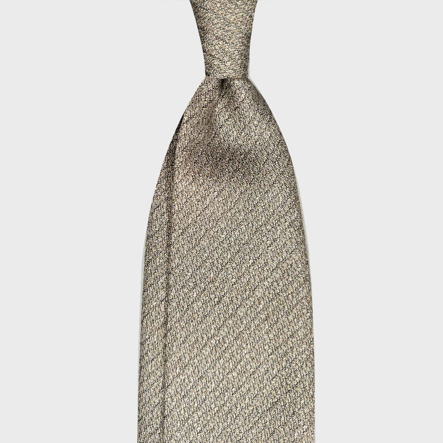 Greige Silk Tie Men's Clothing Store Geneva. Greige silk tie with beige, ivory and grey mélange texture. Handmade in Italy and selected by Wools Boutique Uomo Geneva ties store.