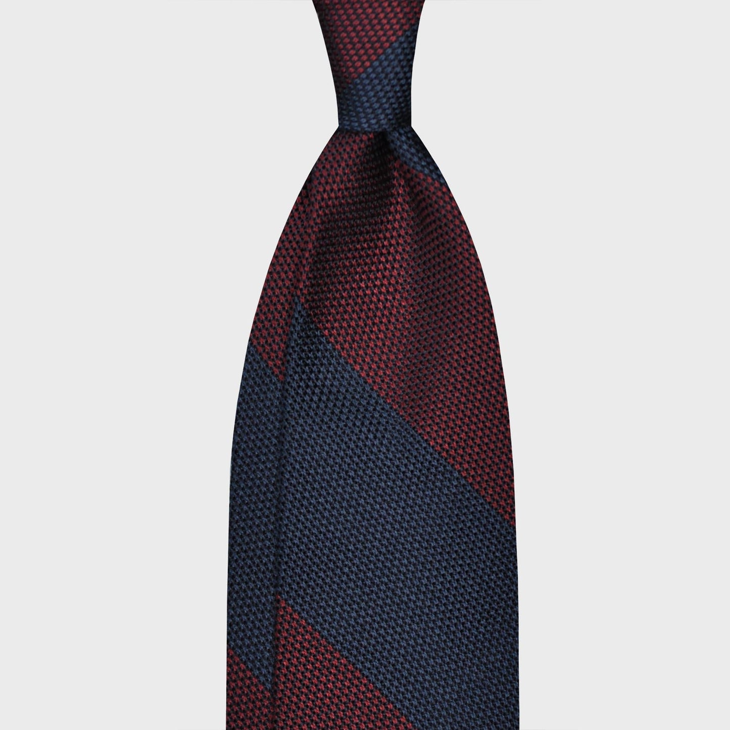 Load image into Gallery viewer, Burgundy Red Regimental Grenadine Silk Tie Wide Striped. Wide striped silk tie made with refined grenadine silk, hand made tie F.Marino Napoli exclusive for Wools Boutique Uomo, hand rolled edge, 3 folds unlined, striped burgundy red and navy blue
