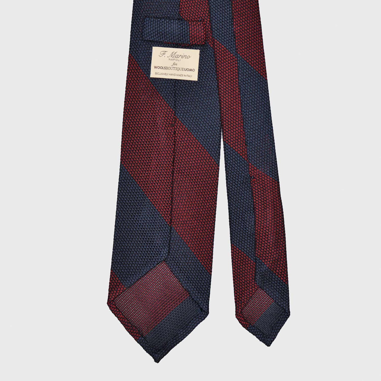 Wide striped silk tie made with refined grenadine silk, hand made tie F.Marino Napoli exclusive for Wools Boutique Uomo, hand rolled edge, 3 folds unlined, striped burgundy red and navy blue