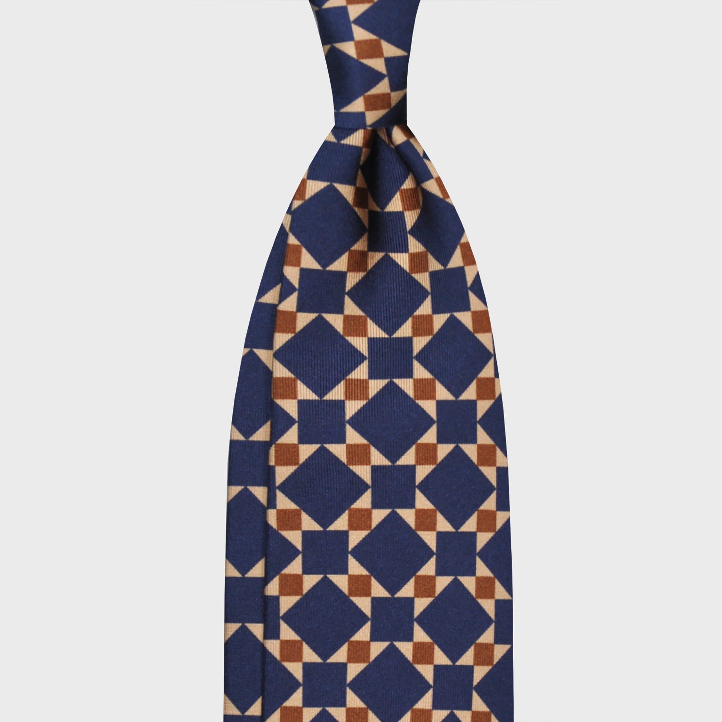 Cobalt Blue Mosaic Pattern Silk Tie. Exclusive silk tie made with finest Italian silk soft to the touch, sand beige background with cobalt blue and rust brown mosaic pattern, unlined tie 3 folds, F.Marino Napoli ties exclusive for Wools Boutique Uomo