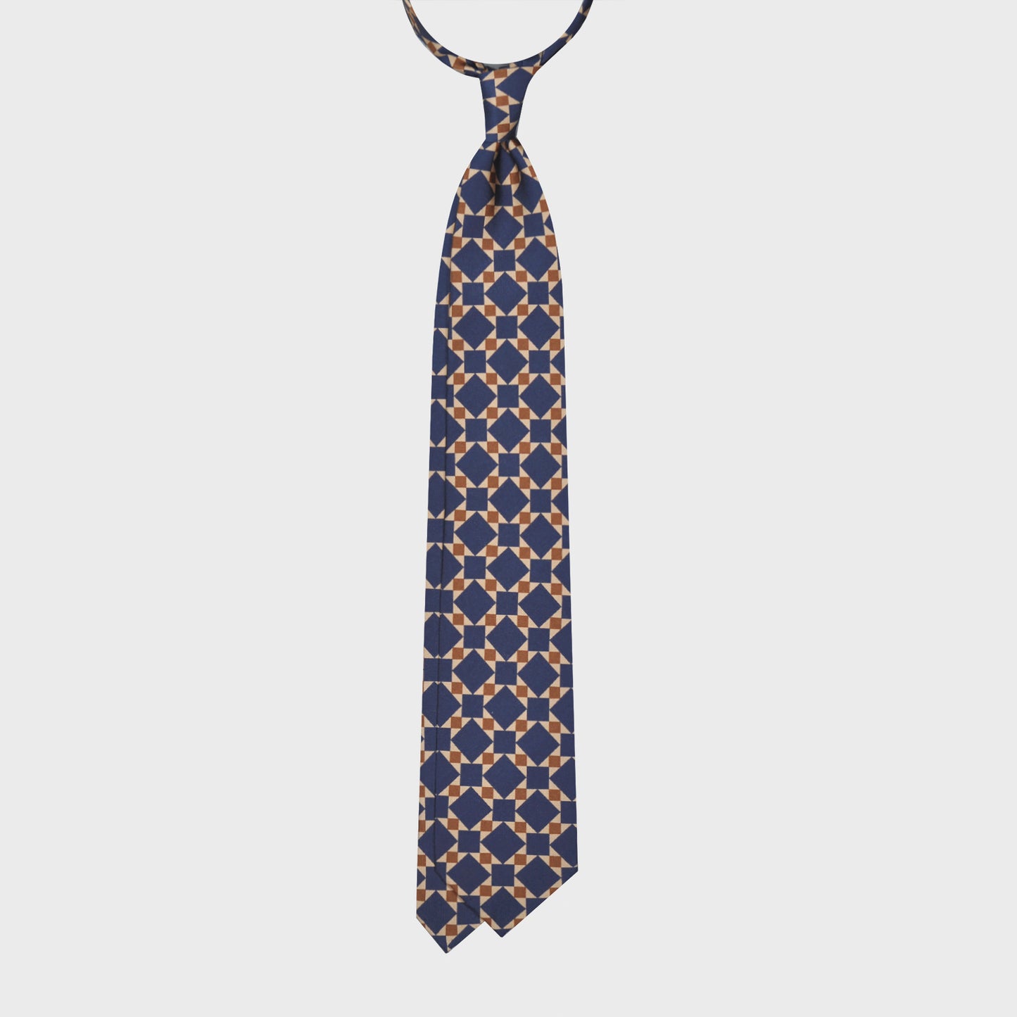 Exclusive silk tie made with finest Italian silk soft to the touch, sand beige background with cobalt blue and rust brown mosaic pattern, unlined tie 3 folds, F.Marino Napoli ties exclusive for Wools Boutique Uomo