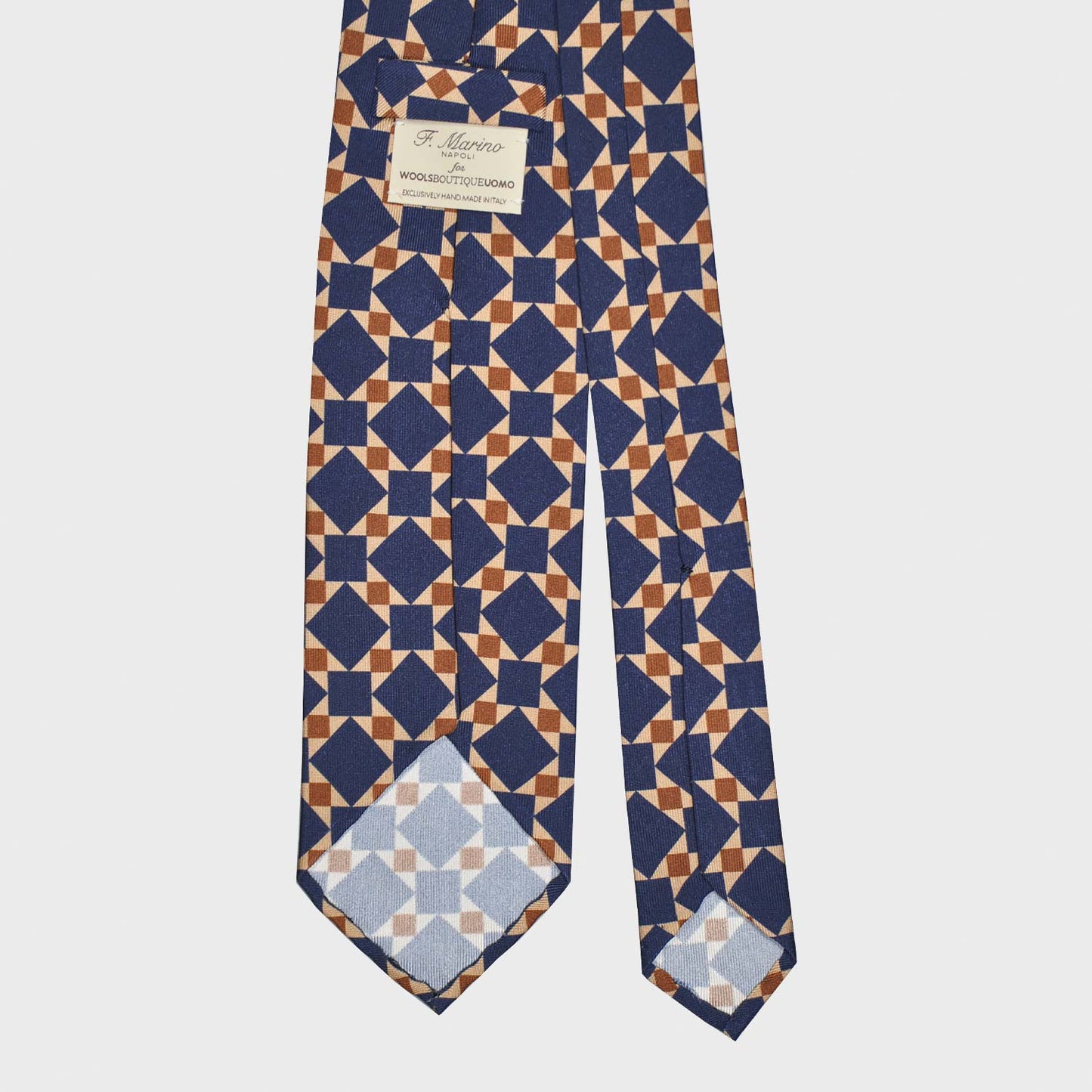 Exclusive silk tie made with finest Italian silk soft to the touch, sand beige background with cobalt blue and rust brown mosaic pattern, unlined tie 3 folds, F.Marino Napoli ties exclusive for Wools Boutique Uomo