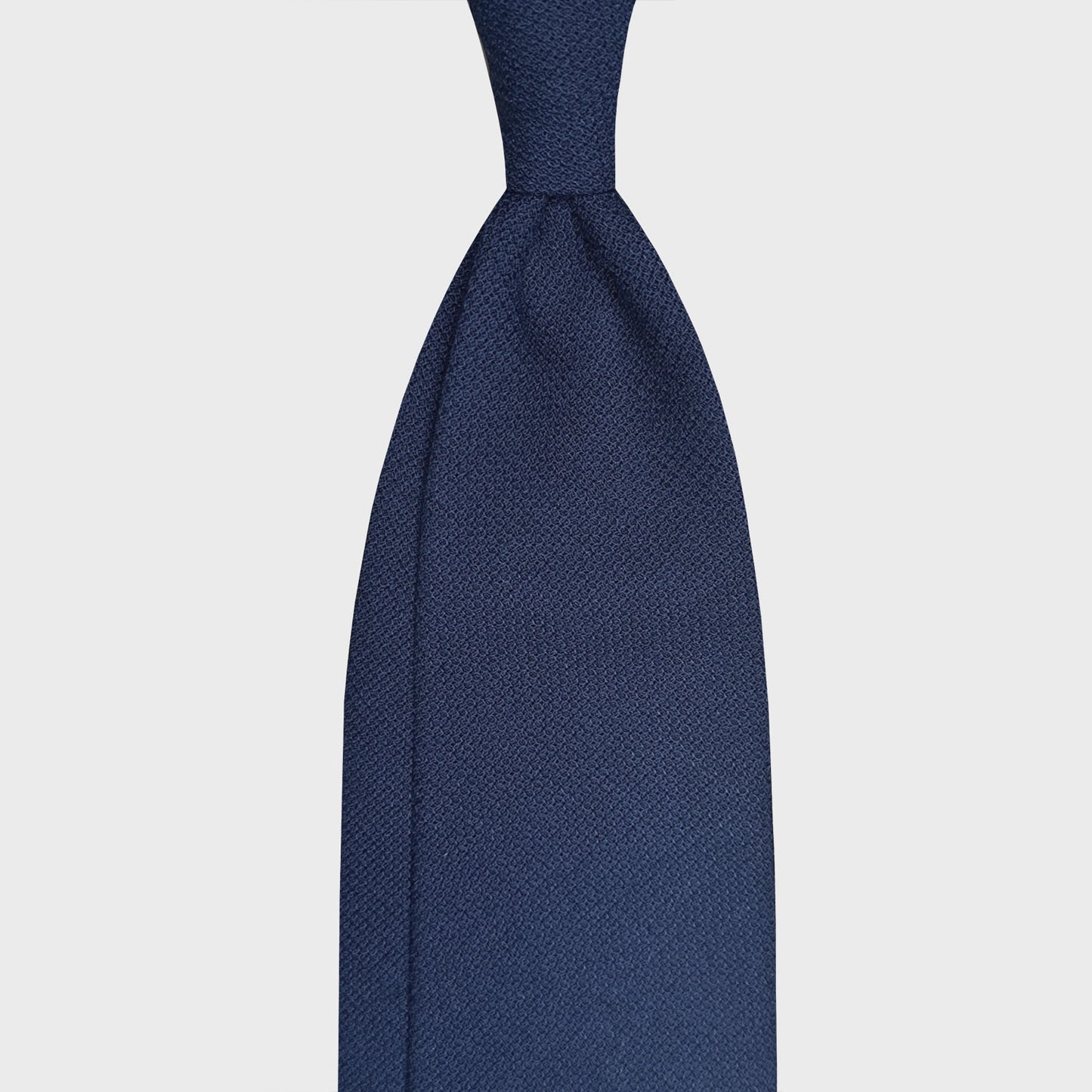 Navy Blue Wool Tie Hopsack Plain Color. Classic wool tie made with soft hopsack wool, navy blue plain color, handmade Italian tie collection Wools Boutique Uomo Geneva, ideal for outfits 4 season