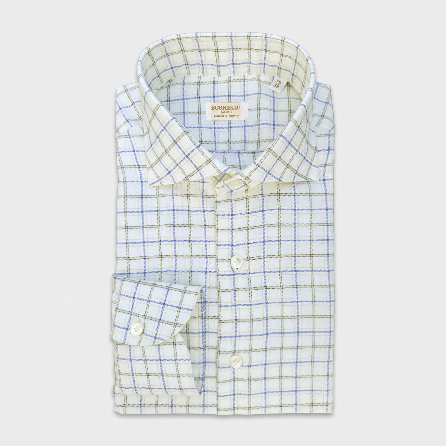 Ivory White Cotton Flannel Shirt English Country Windowpane. A timeless English country windowpane shirt made with the finest and softest Italian flannel cotton, handmade in Italy by Borriello Napoli, exclusively for Wools Boutique Uomo. It has a soft finish and a silky touch, making it comfortable to wear in the mid-seasons and in winter, ideal for sporty, elegant outfits with a tie or sweater.