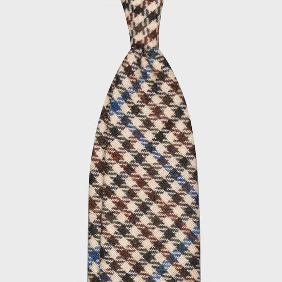 Ivory White Tweed Necktie Classic Checked. Cool tweed tie, wool texture to the touch bristly feeling, unlined checked wool tie handmade in Italy by F.Marino Napoli exclusive for Wools Boutique Uomo, ivory white background, coffee brown and dark loden green checked, cobalt blue windowpane