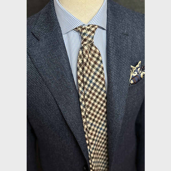 Ivory White Tweed Necktie Classic Checked. Cool tweed tie, wool texture to the touch bristly feeling, unlined checked wool tie handmade in Italy by F.Marino Napoli exclusive for Wools Boutique Uomo