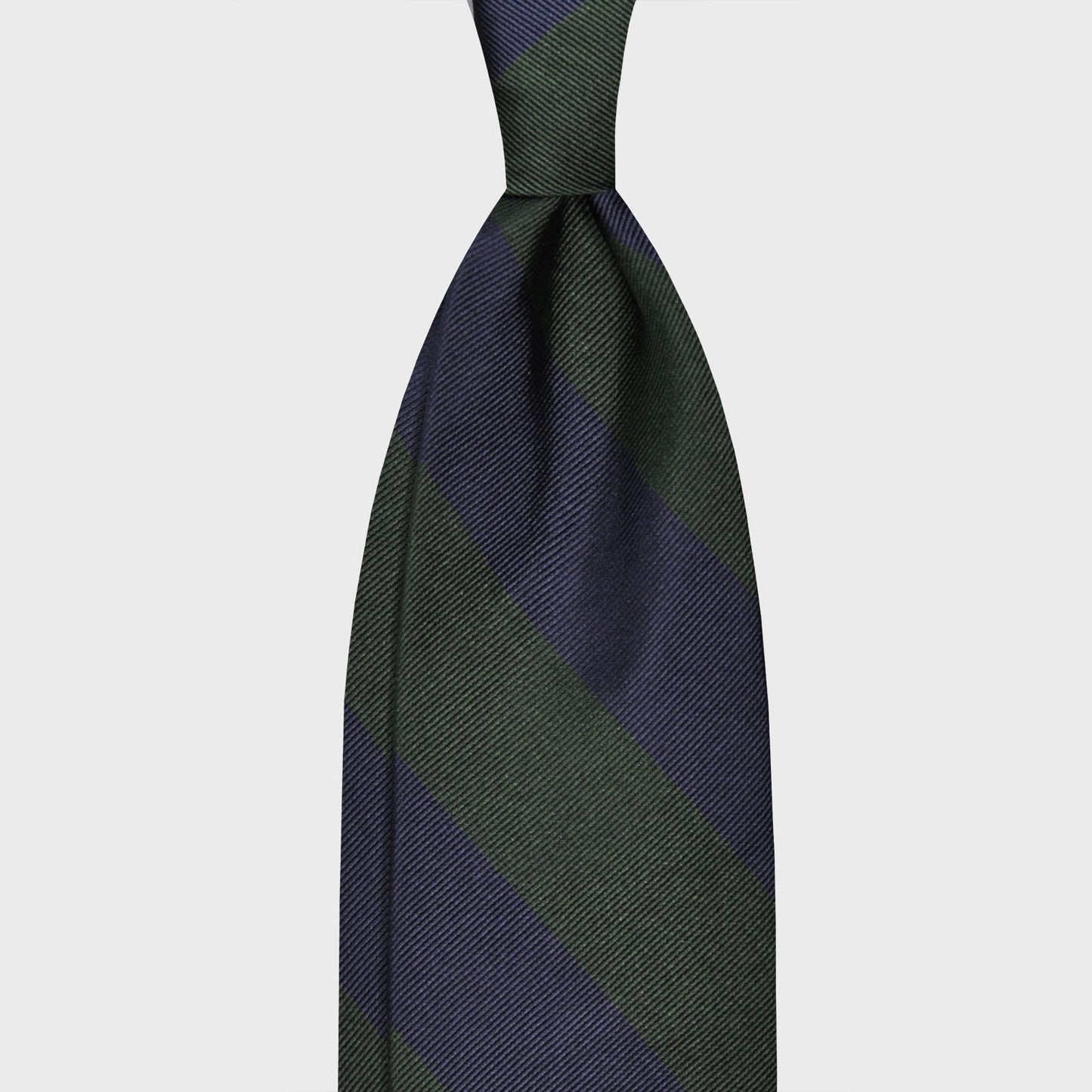 Pine Green Wide Striped Regimental Jacquard Silk Tie. Classic jacquard silk tie with wide striped pine green and navy blue, handmade in Italy by F.Marino Napoli exclusive for Wools Boutique Uomo, unlined regimental red tie 3 folds hand rolled edge.