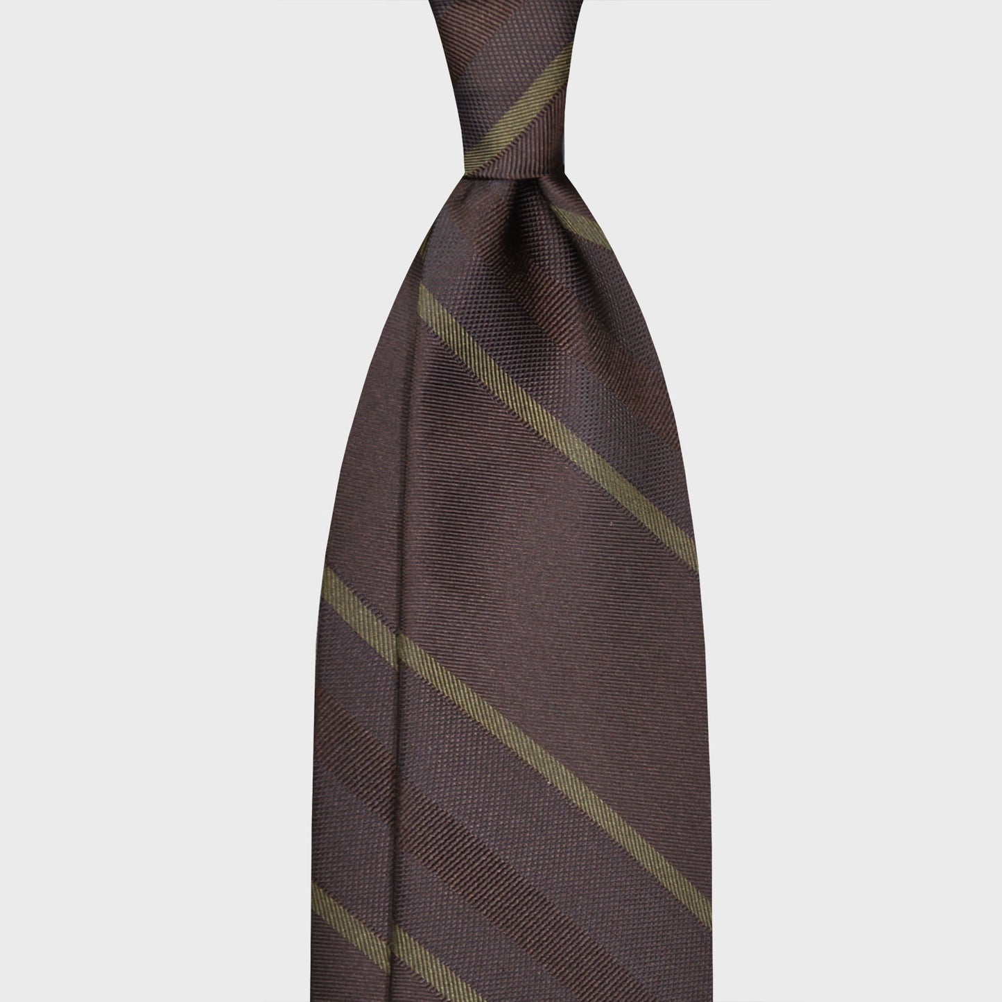 Wengè Brown Regimental Silk Tie. Elegant striped silk necktie, refined wengè brown background with army green striped, handmade in Italy by F.Marino Napoli exclusive for Wools Boutique Uomo, unlined regimental jacquard necktie 3 folds hand rolled edge.