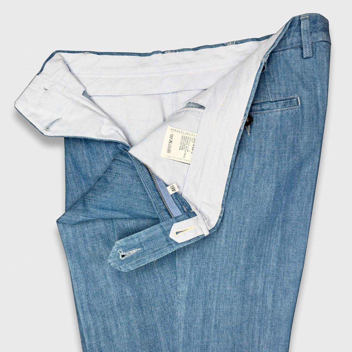 Load image into Gallery viewer, Light Blue Tailored Chambray Jeans Canvas Kurabo. This timeless color light blue chambray jeans canvas fabric, soft and smooth to the touch is perfect for to creating tailored trousers with double pleats and high rise. Rotasport by Rota pantaloni, handmade in Italy with a soft and refined Japanese Kurabo denim fabric.
