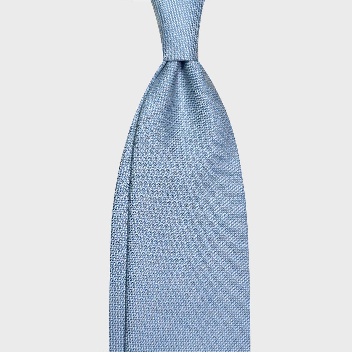 Light Blue Wool Tie Canvas Pattern Perfect for Every Seasons. Luxury light blue wool tie made in Italy with light wool extra fine canvas pattern, classic tie for every seasons, men's ties store Geneva Wools Boutique Uomo