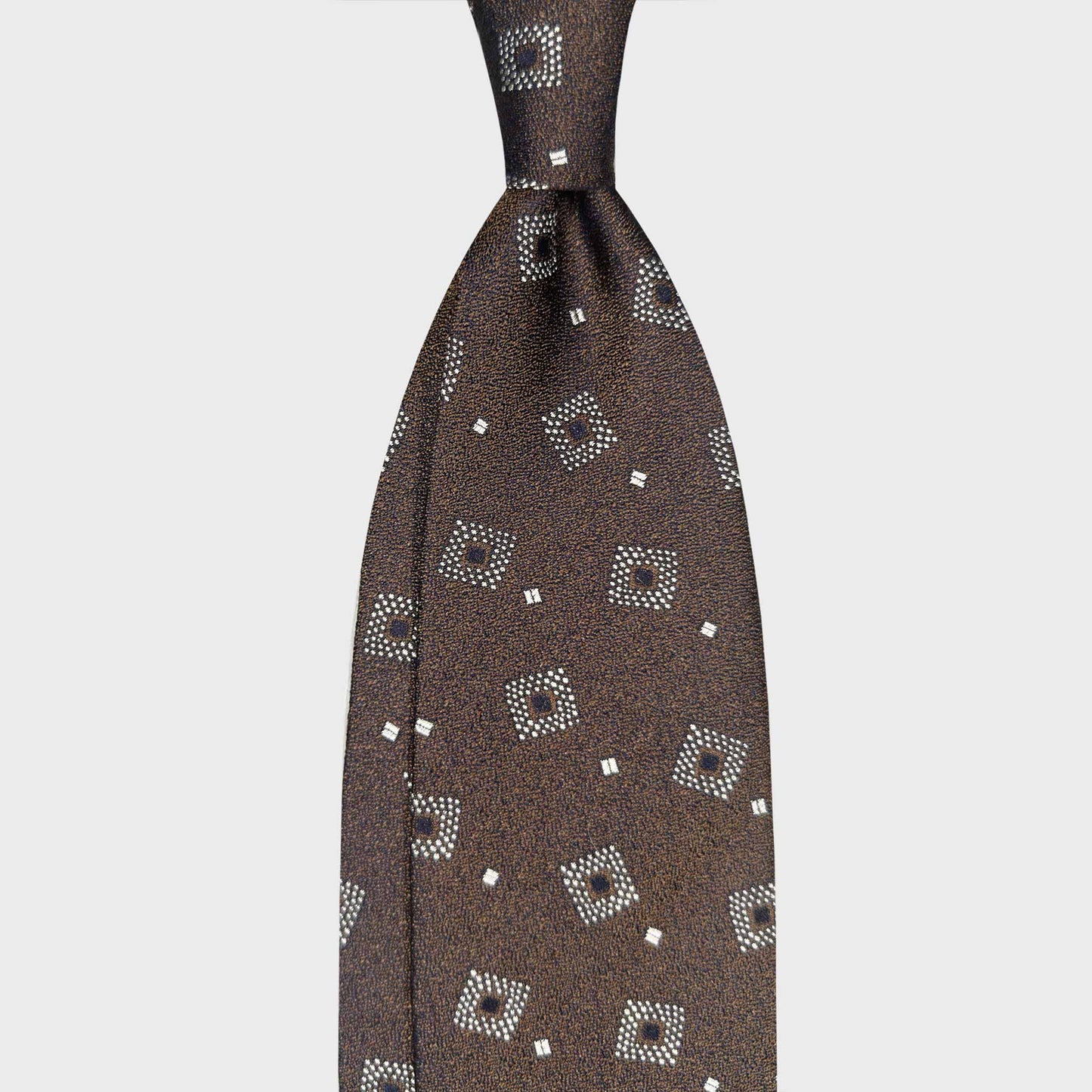 Wools Boutique Uomo Geneva coffee brown melange silk tie medallion pattern front view