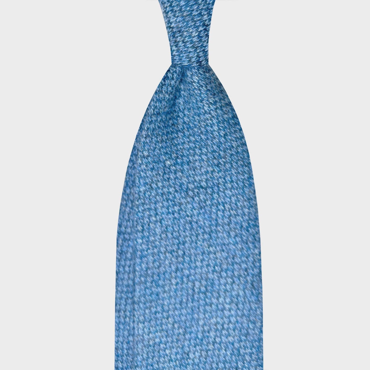 Barleycorn Tweed Sky Blue Men's Wool Tie Geneva. Exclusive wool tweed tie available at men's ties store Geneva Wools Boutique Uomo, lightweight tweed with soft touch texture, sky blue barleycorn fabric