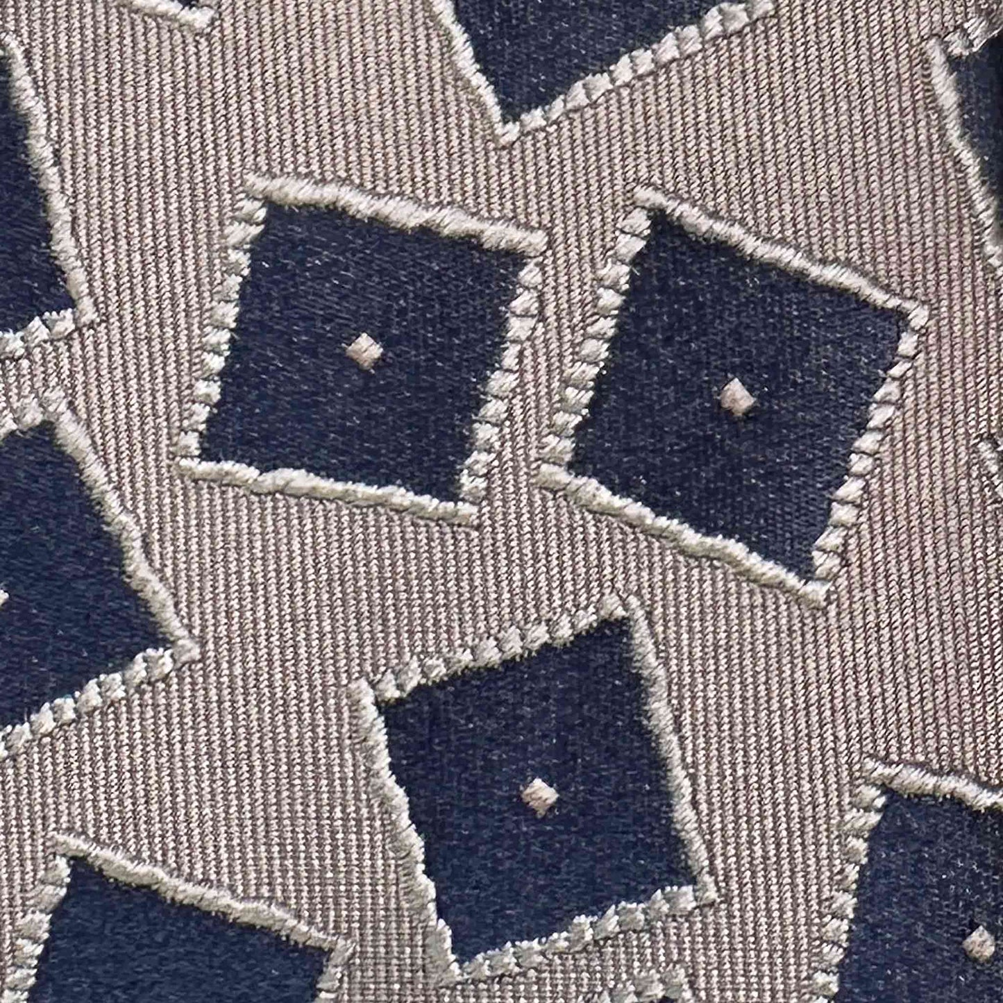 Details of Ivory Silk Tie with Navy Blue Square Medallions.