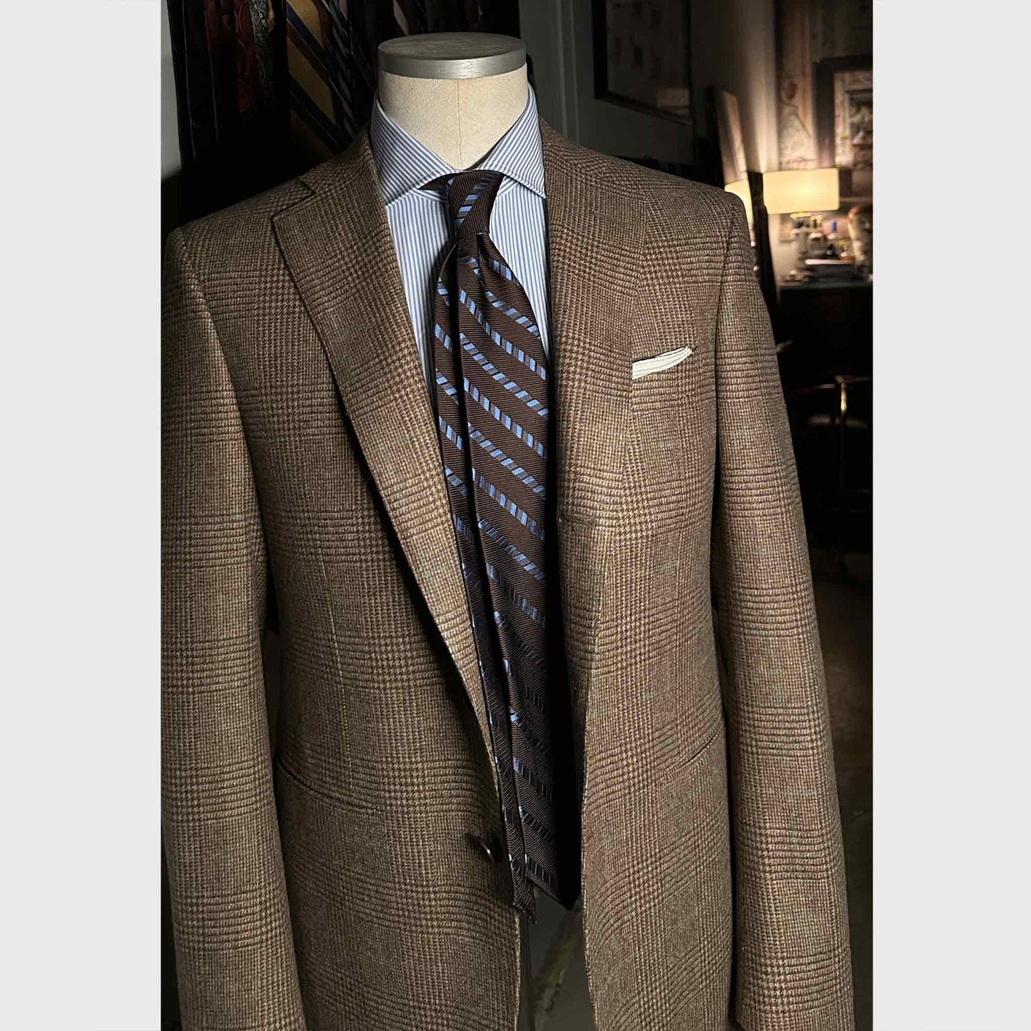 Outfit for Coffee brown silk tie featuring classic regimental stripes in sky blue tones.