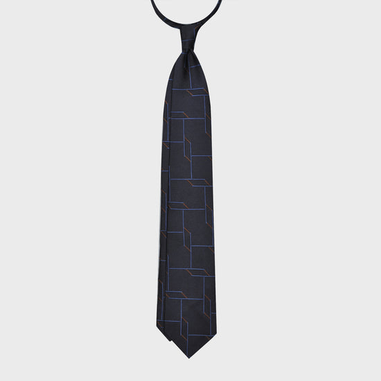 Load image into Gallery viewer, Handmade tie made with soft partridge eye silk, unlined hand rolled edge 3 folds, navy blue color background, F.Marino Napoli ties exclusive handmade in Italy for Wools Boutique Uomo
