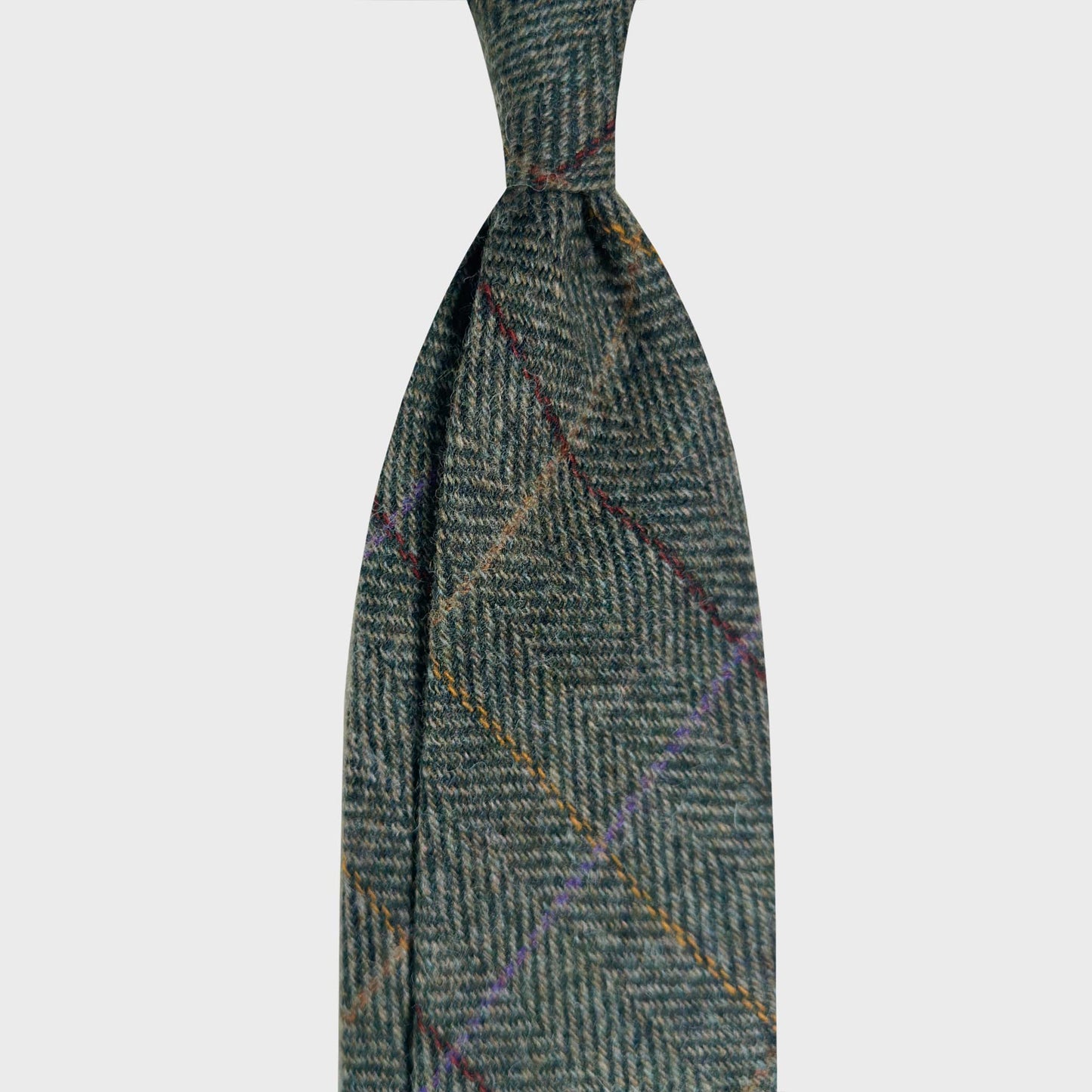 Olive Green Tweed Wool Tie Herringbone Hand Made in Italy. Timeless herringbone wool tie made with soft tweed wool fabric, olive green color, discover at Wools Boutique Uomo men's ties store 