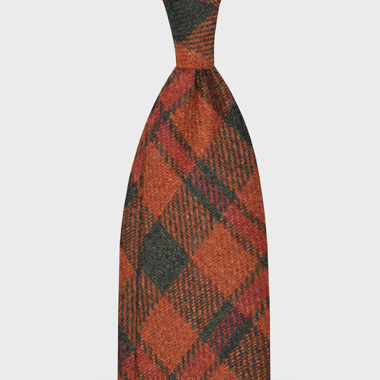 Orange Plaid Checks Wool Tweed Unlined Handmade Tie. Unlined wool tie, hand rolled edge, 100% wool tweed, light weight, soft texture to the touch, bristly feeling, F Marino ties for Wools Boutique Uomo, orange and bottle green checks pattern