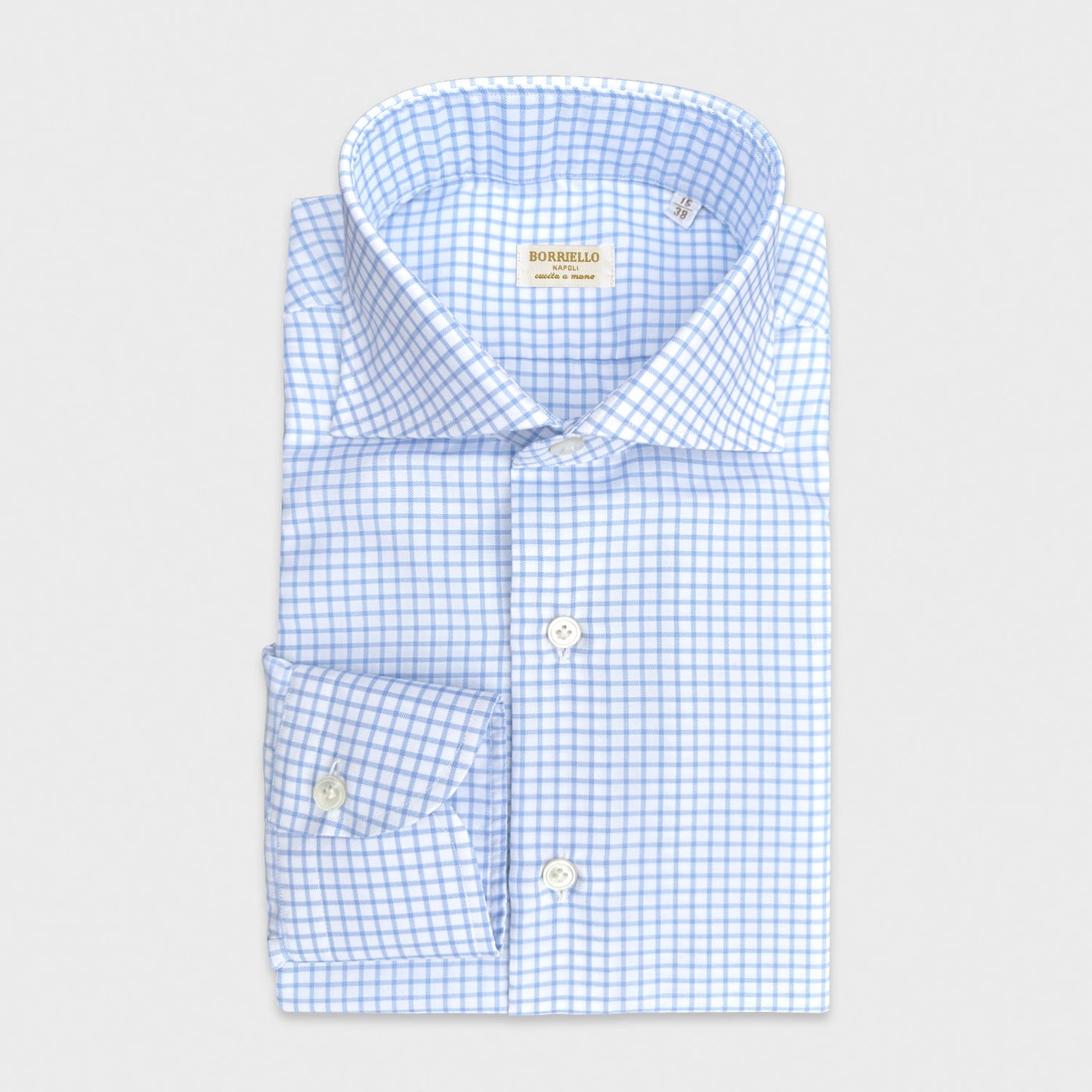 Classic Men's Check Cotton Oxford Shirt Hand Made in Italy. Timeless men's oxford cotton shirt, light blue check shirt, ideal for classic and sporty outfits, discover in Wools Boutique Uomo men's shirts store in geneva