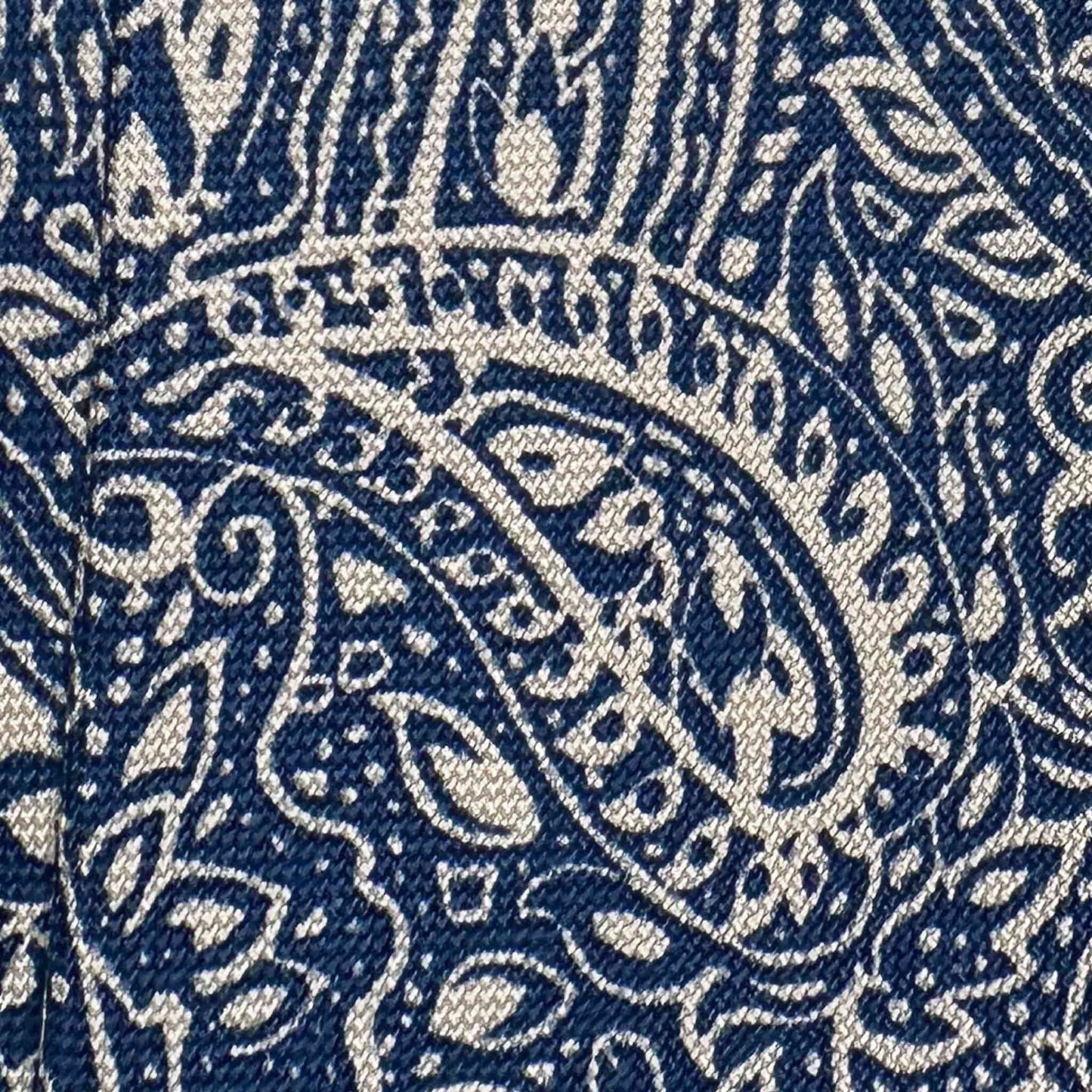 Details of Ivory Panama Silk Tie Bold Paisley Design. 