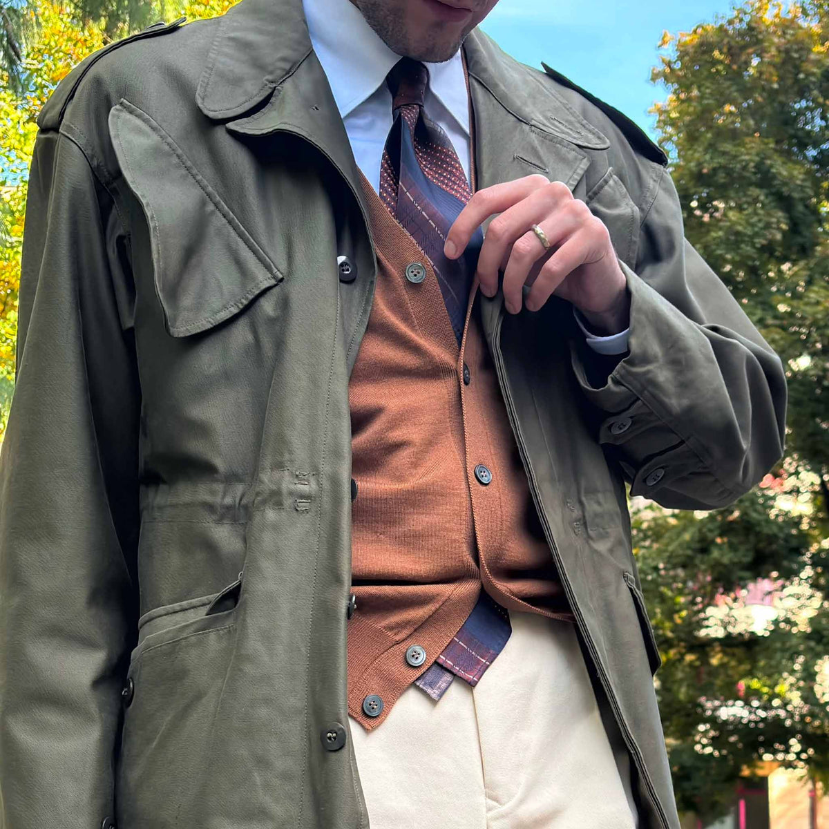 Exclusive and original striped silk tie, printed patchwork pattern, with army green vintage jacket