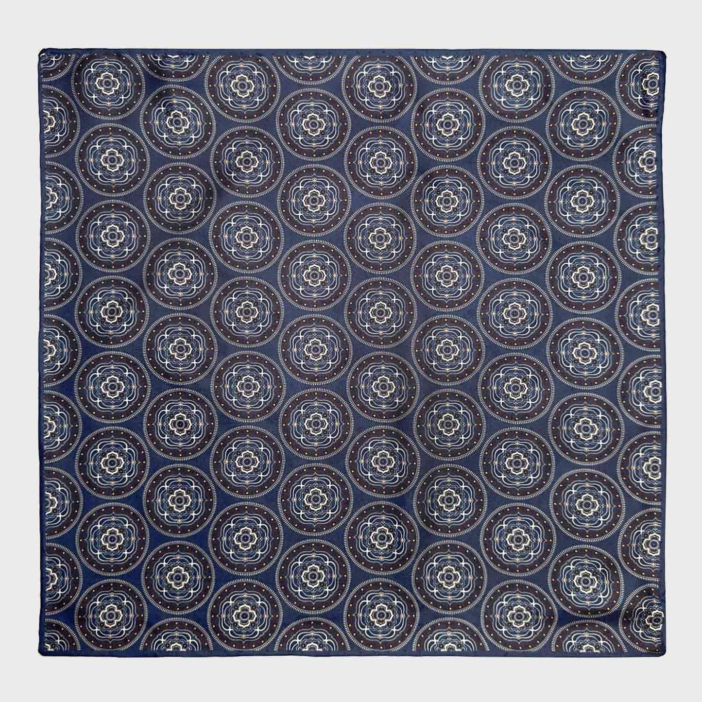 Denim Blue Silk Pocket Square Mandala Medallions. Elegant blue pochette made with soft silk and with rolled edge, denim blu background with brown and white mandala medallions pattern, ideal for a refined men's outfit