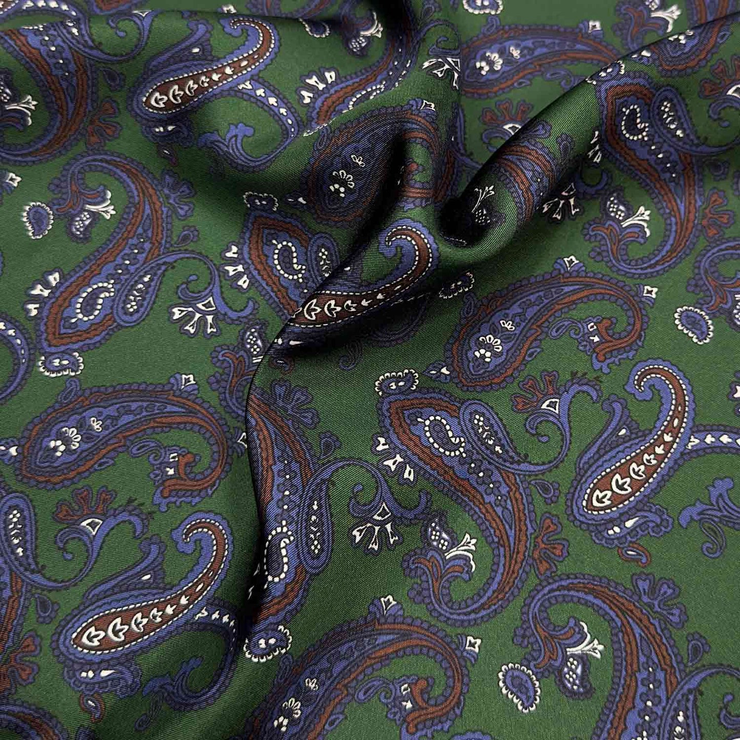 Grass Green Silk Pocket Square Paisley Pattern. Men's paisley pocket square made with soft silk and with rolled edge, grass green background with coffee brown and denim blue paisley pattern