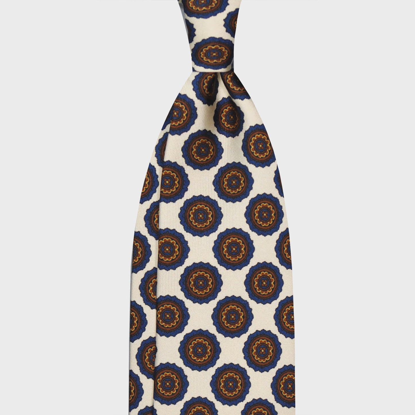Load image into Gallery viewer, White Medallions Silk Tie. Men&amp;#39;s white silk tie made with finest Italian silk soft to the touch, unlined tie 3 folds, refined medallions printed pattern cobalt blue and brown, classic handmade tie F.Marino Napoli exclusive for Wools Boutique Uomo
