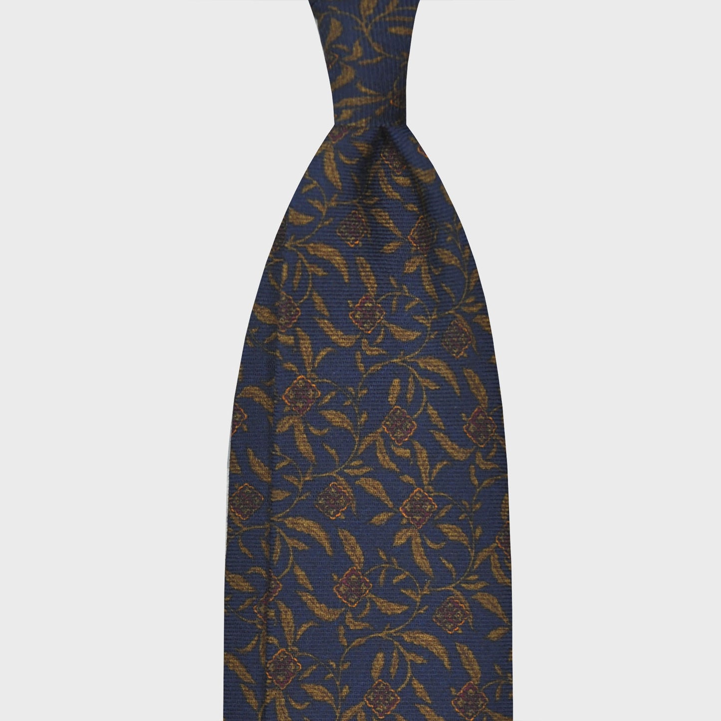 Blue Wool Tie Liberty Flowers Printed. Men's blue tie made with finest Italian wool soft fabric to the touch, unlined tie 3 folds, regular knot, olive green and brown flowers liberty pattern, handmade tie F.Marino Napoli exclusive for Wools Boutique Uomo