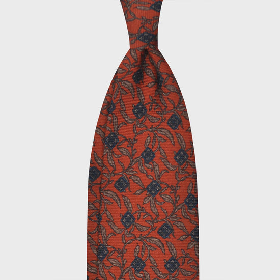 Orange Wool Tie Liberty Flowers Printed. Men's orange tie made with finest Italian wool soft fabric to the touch, unlined tie 3 folds, regular knot, blue and beige flowers liberty pattern, handmade tie F.Marino Napoli exclusive for Wools Boutique Uomo