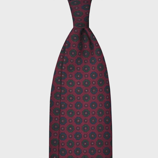 Burgundy Flowers Printed Wool Tie. Timeless burgundy tie made with finest Italian wool soft fabric to the touch, unlined tie 3 folds, regular knot ideal to wear with formal outfits. Hand made in Italy by F.Marino Napoli exclusive for Wools Boutique Uomo
