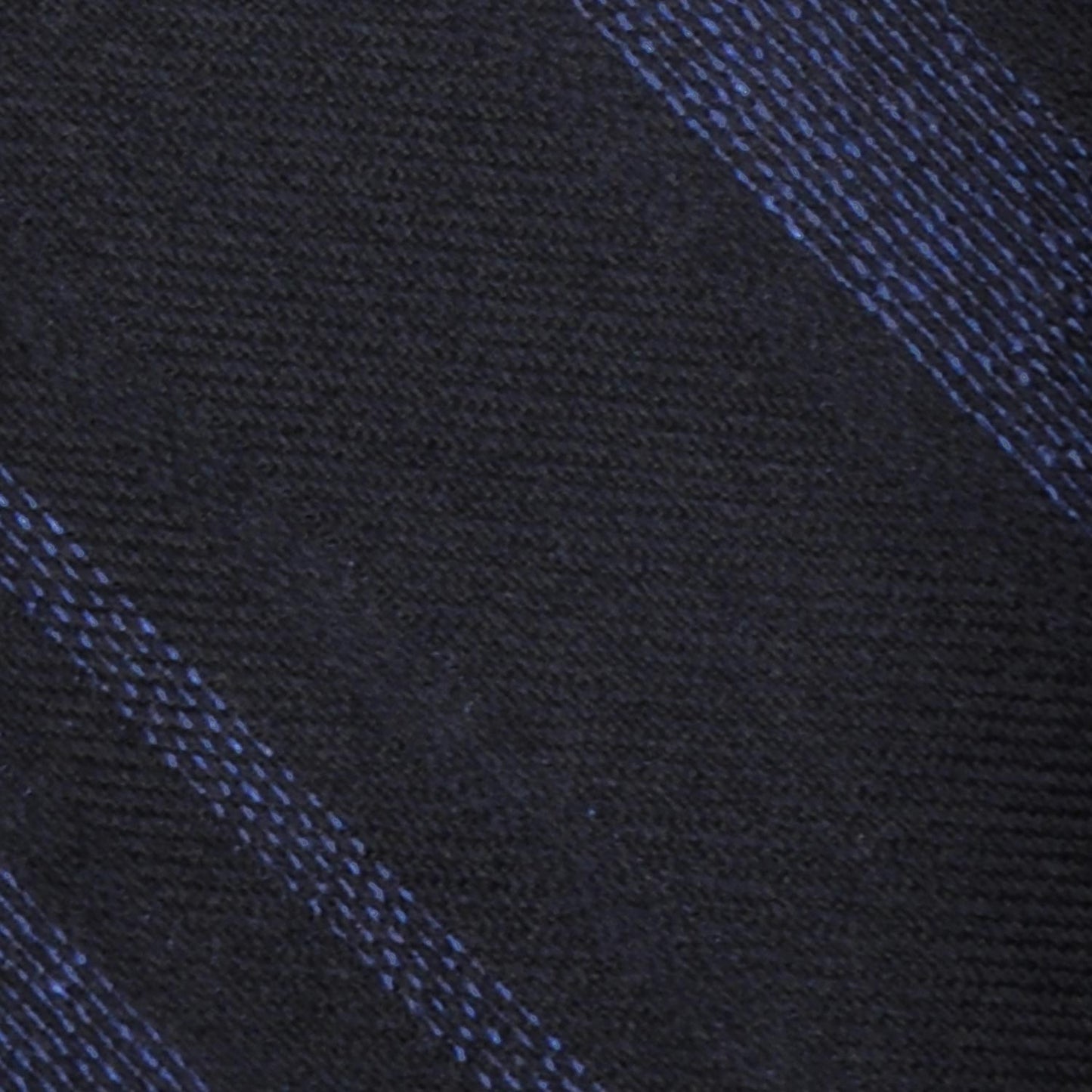 Navy Blue Silk Wool Striped Tie. Elegant regimental necktie made with silk and wool, hand rolled edge, unlined 3 folds, navy blue background with denim blue striped
