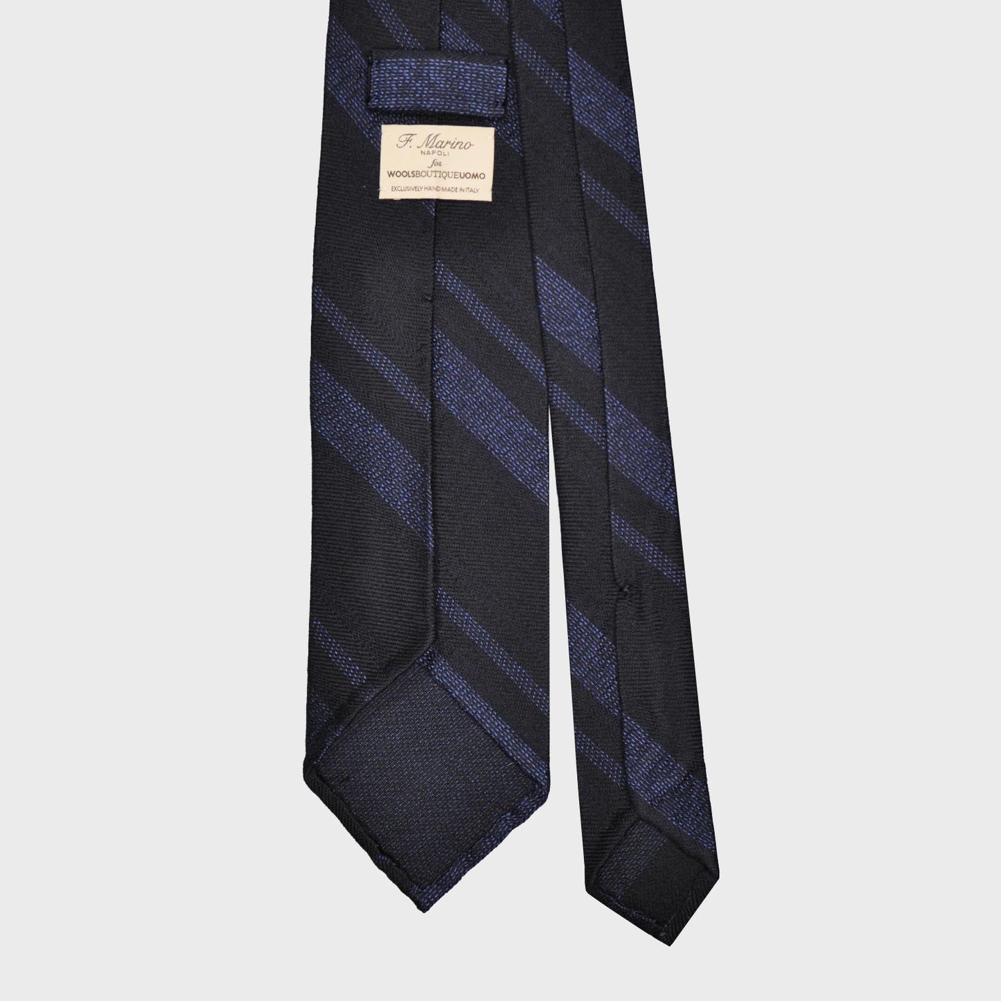 Navy Blue Silk Wool Striped Tie. Elegant regimental necktie made with silk and wool, hand rolled edge, unlined 3 folds, navy blue background with denim blue striped