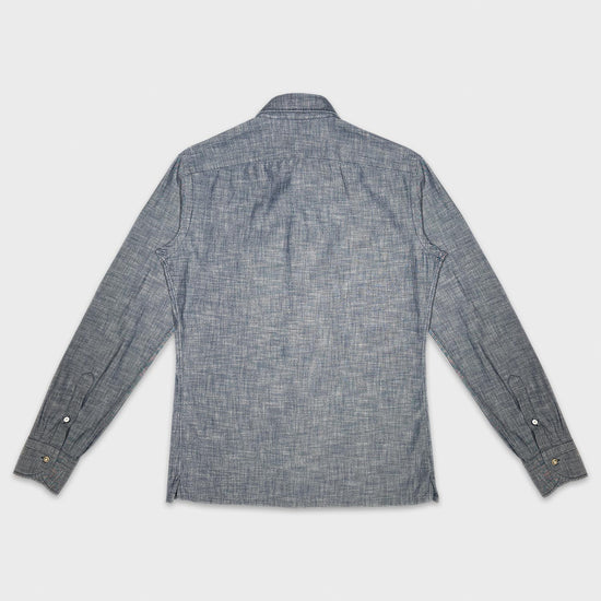 Men's safari shirt handmade in Italy by Borriello Napoli. The model of this sporty shirt is originally designed for safari trips, it has always been appreciated for its comfort with four pockets in the front, always trendy in this flamed indigo navy color.