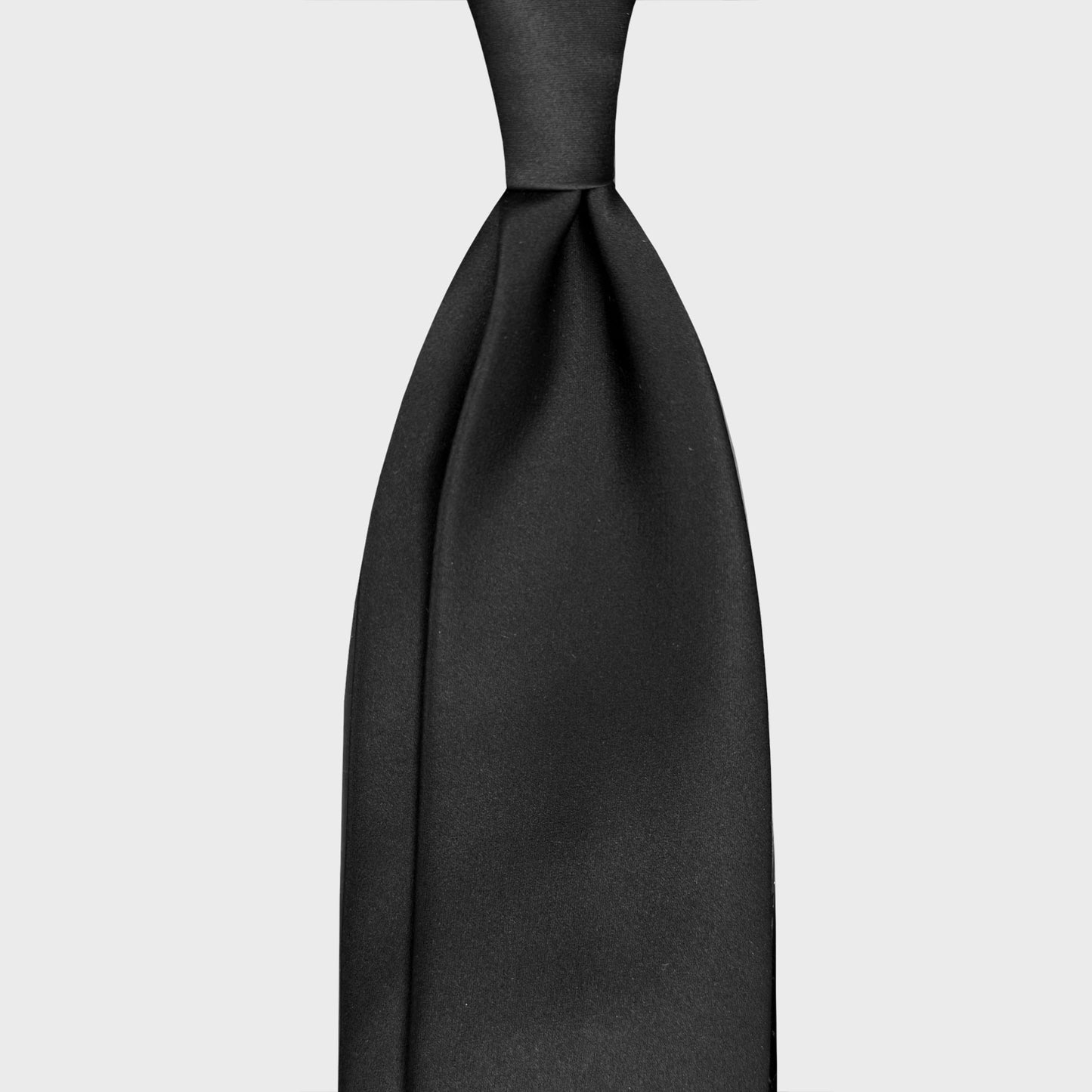 Classic Black Satin Silk Tie Handmade in Italy. Elegant black tie made with satin silk, explore collection of handmade men's silk ties Geneva Switzerland, F.Marino black ties exclusive for Wools Boutique Uomo
