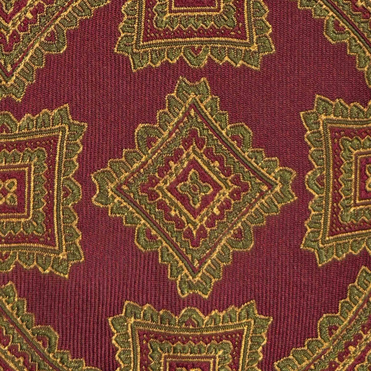 Burgundy silk tie with vintage medallions pattern detail