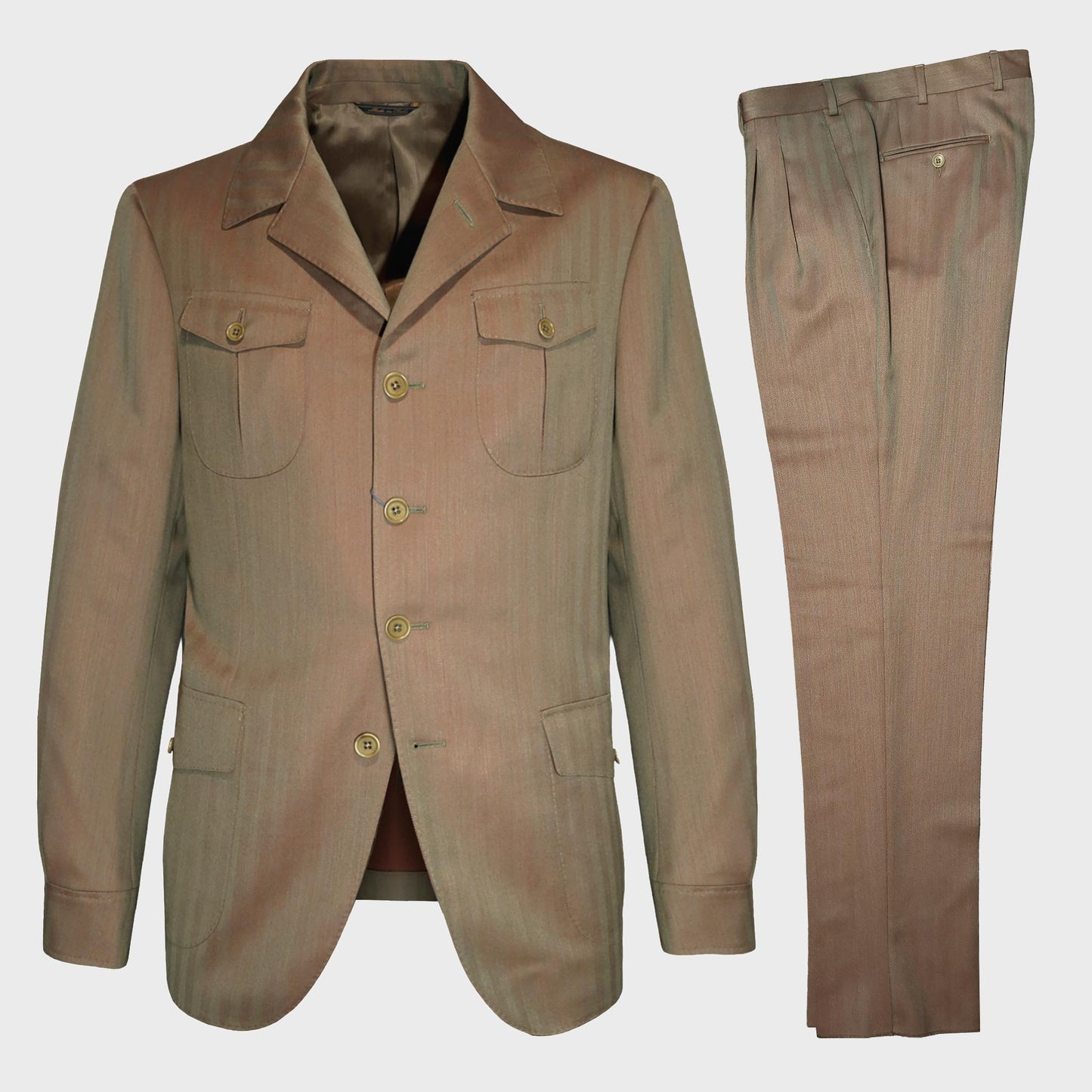 Tailoring Sahariana Suit Solaro Wool Fabric John Foster. Exclusive Solaro Sahariana wool suit at Wools Boutique Uomo Geneva. Made in Italy with refined John Foster Solaro wool for timeless sartorial menswear.