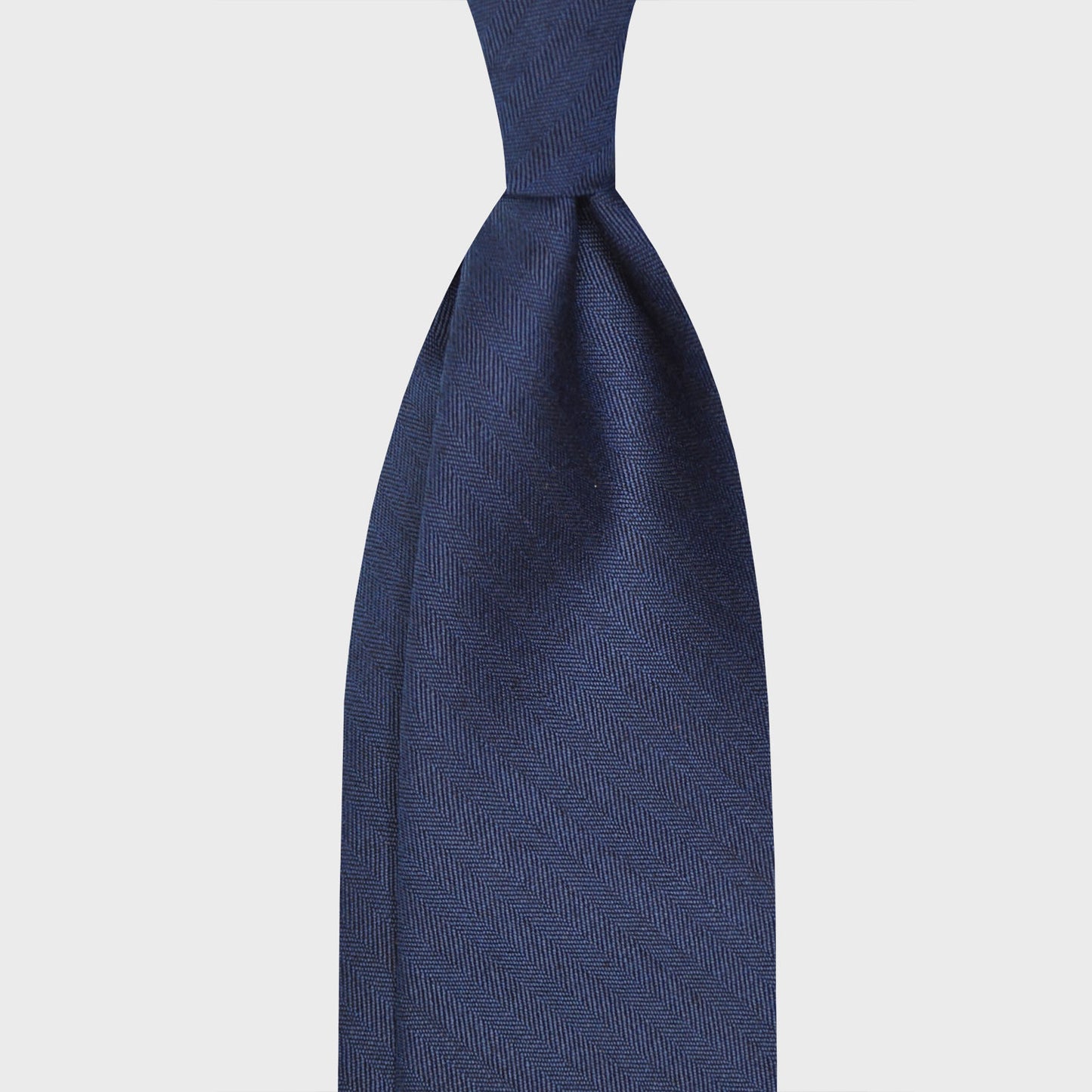 Oxford Blue Solaro Tie Holland&Sherry Wool. Elegant wool tie made with the iconic Hollande & Sherry solaro fabric 120's oxford blue color, unlined 3 folds, handmade tie F.Marino Napoli for Wools Boutique Uomo