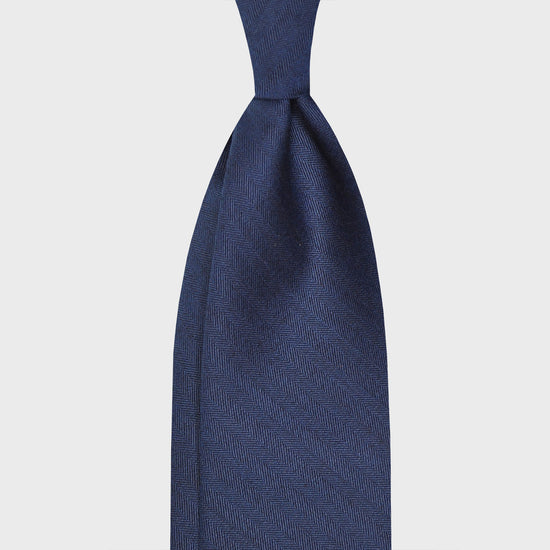 Oxford Blue Solaro Tie Holland&Sherry Wool. Elegant wool tie made with the iconic Hollande & Sherry solaro fabric 120's oxford blue color, unlined 3 folds, handmade tie F.Marino Napoli for Wools Boutique Uomo