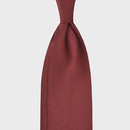 Burgundy Red Plain Tie Holland&Sherry Wool. Plain wool tie made with the Hollande & Sherry worsted wool, unlined 3 folds, soft and silky to the touch, burgundy red plain color, handmade tie F.Marino Napoli for Wools Boutique Uomo