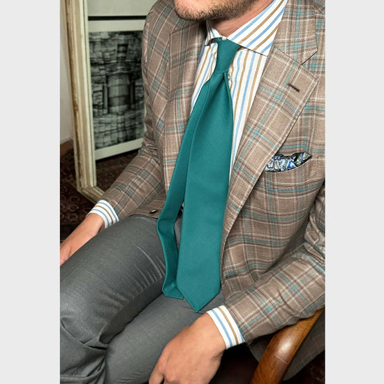 Emerald Green Plain Tie Holland&Sherry Wool. Plain wool tie made with the Hollande & Sherry worsted wool, unlined 3 folds, soft and silky to the touch, handmade tie F.Marino Napoli for Wools Boutique Uomo