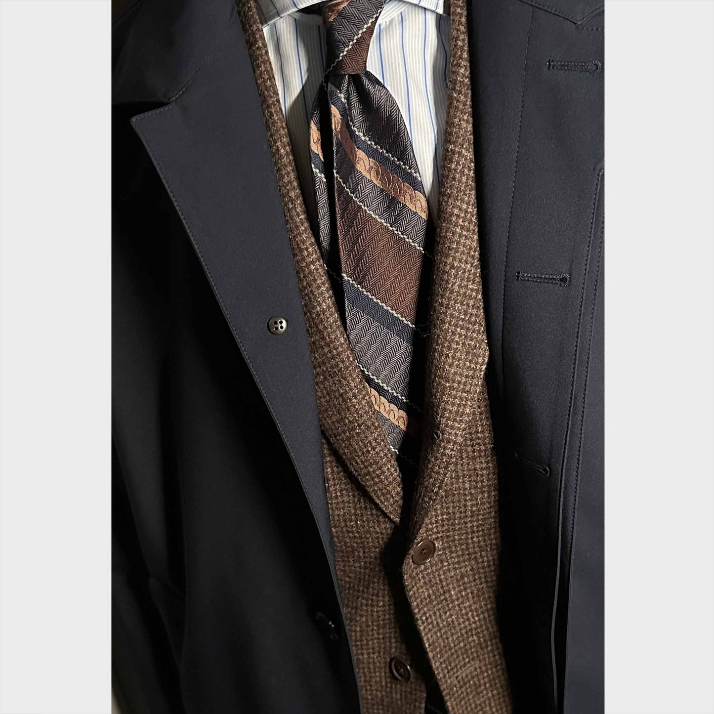 Outfit for regimental silk tie in coffee brown and smoke grey