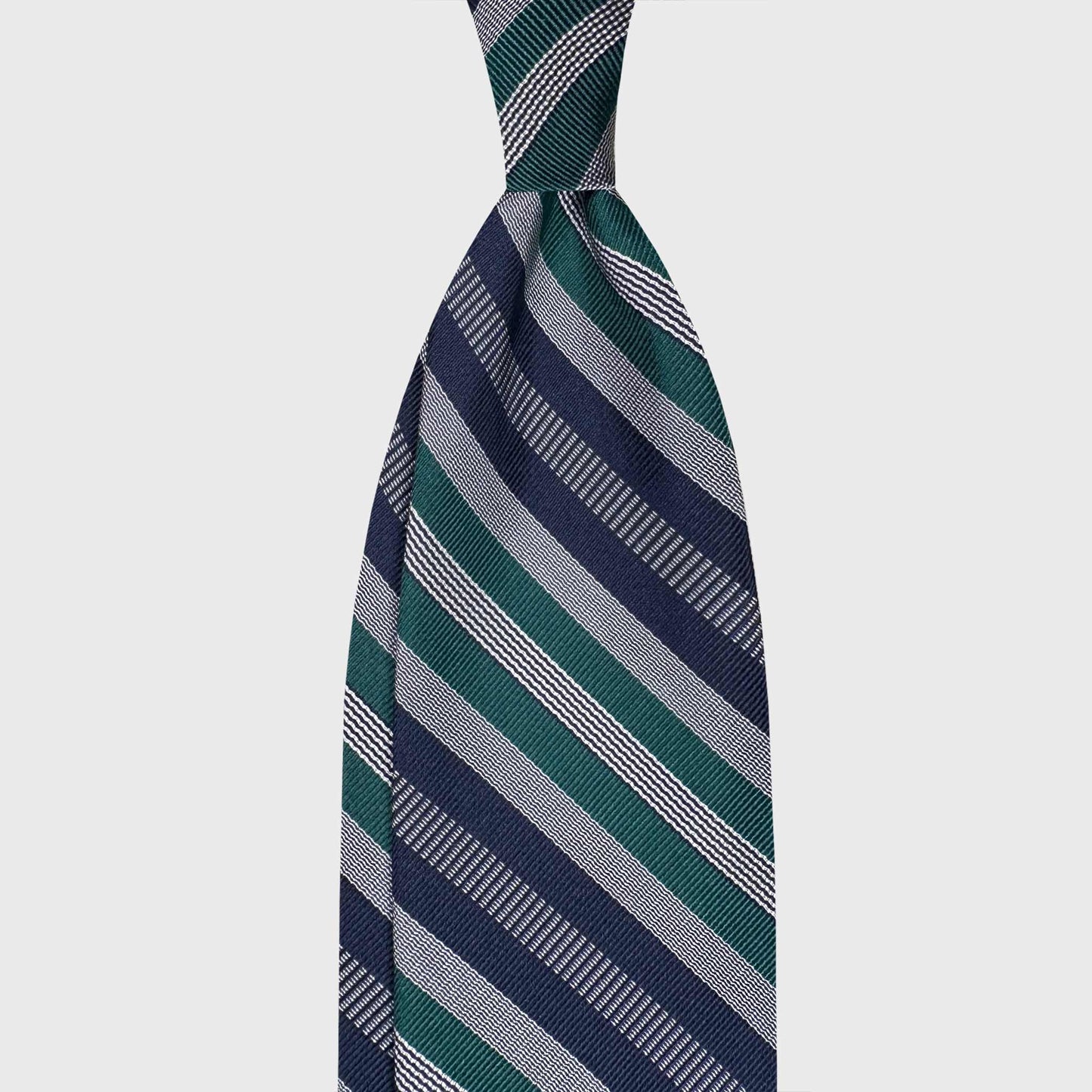 F.Marino Handmade Silk Multi Stripe Tie Navy Blue. Handmade F.Marino silk multi-stripe tie in navy blue, forest green and silver. Crafted in Italy for Wools Boutique Uomo Geneva.