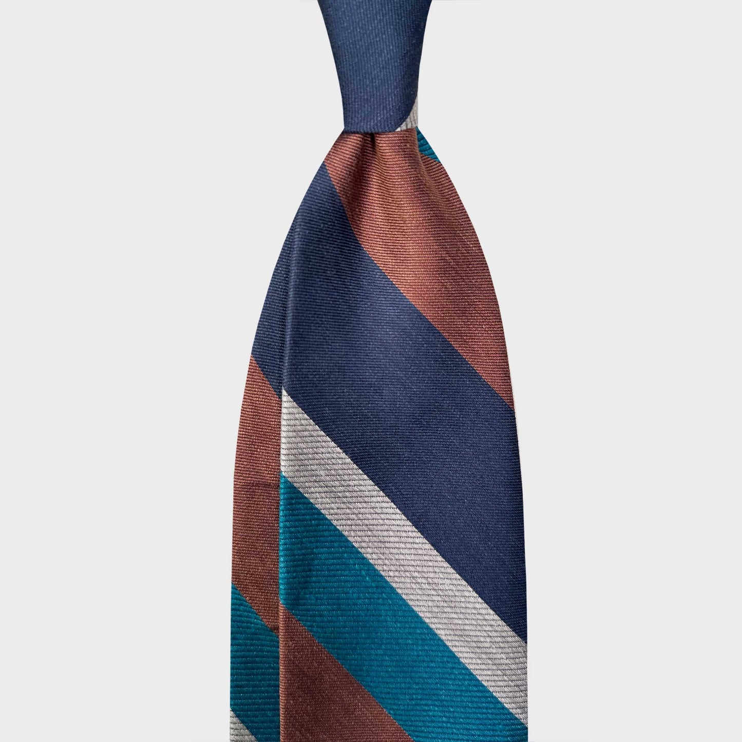 Refined Multicolor Striped Tie Silk Linen Men's Ties Store Geneva. Exclusive multi striped tie made with silk and linen, copper brown, teal water, navy blue, silver grey striped ties, discover at the men's ties shop in Geneva