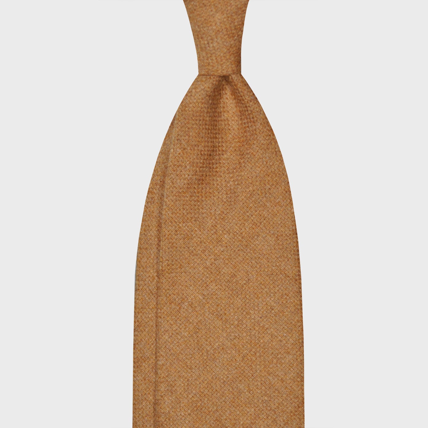 Camel Brown Light Flannel Twill Wool Tie Unlined 3 Folds. Soft and light flannel twill wool tie, handmade F.Marino Napoli for Wools Boutique Uomo, camel brown color, soft fabric to the touch, not bristly, ideal for a regular knot.