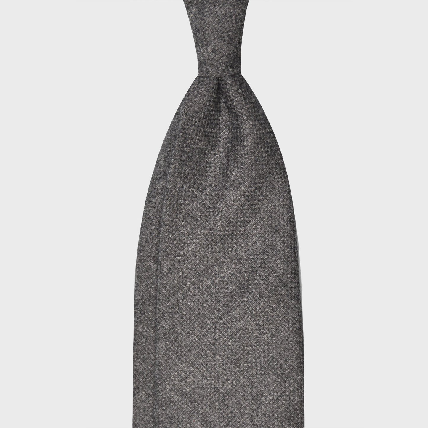 Smoke Grey Flannel Twill Wool Tie Unlined 3 Folds. Soft and light flannel twill wool tie, handmade F.Marino Napoli for Wools Boutique Uomo, smoke grey color, soft fabric to the touch, not bristly, ideal for a regular knot.