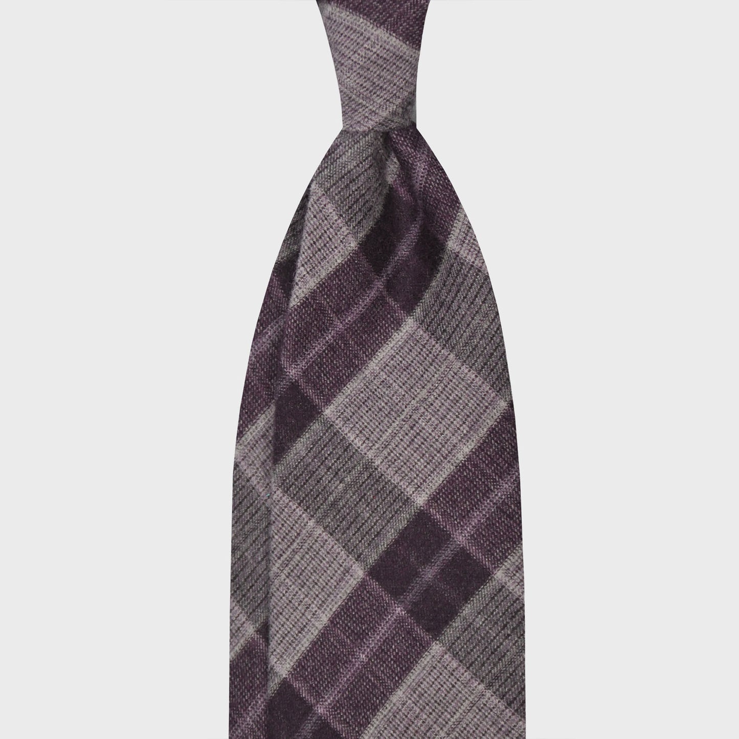 Purple Checks Light Gauze Wool Tie 3 Folds Unlined F.Marino. Light gauze merino wool tie, handmade F.Marino for Wools Boutique Uomo, hand rolled edge, purple and grey checks pattern, soft fabric to the touch, not bristly, ideal for a regular knot.