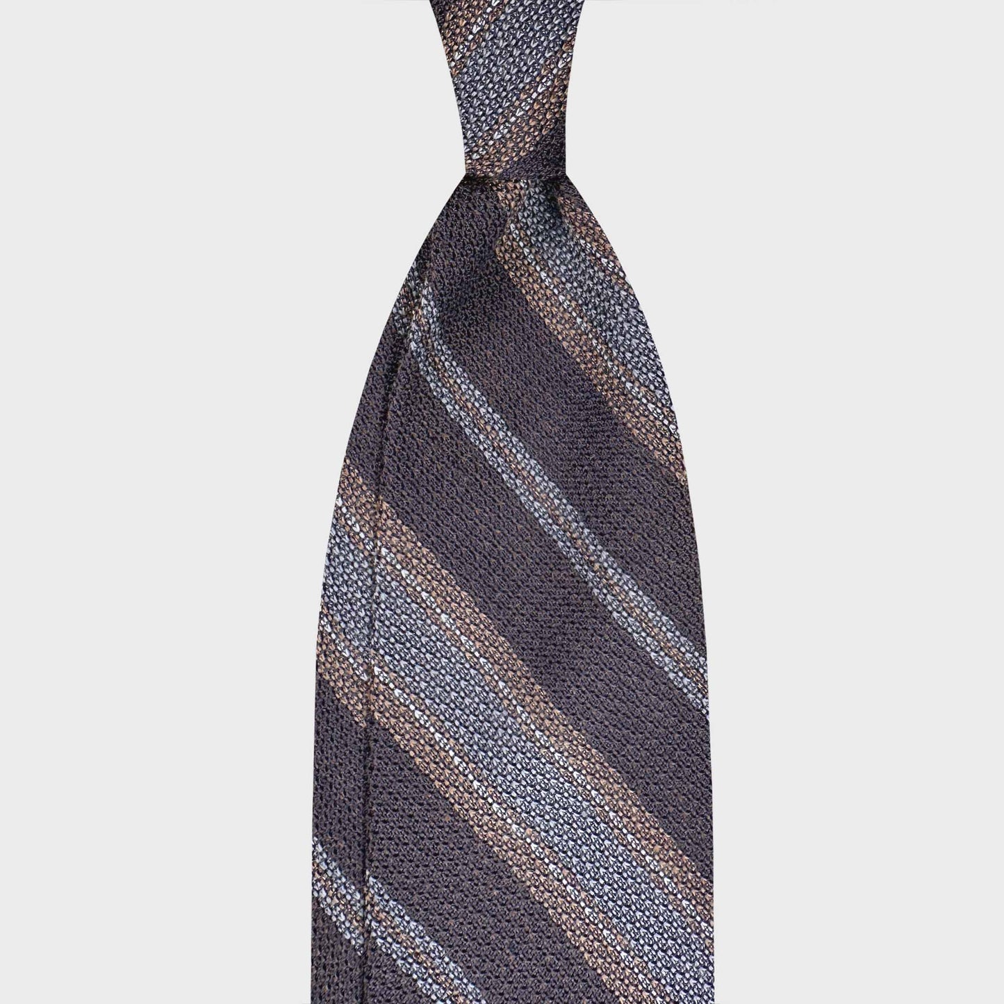 F.Marino Grenadine Regimental Silk Tie Coffee Brown Sand Silver. Handmade F.Marino grenadine silk regimental tie in coffee brown with sand and silver stripes. Crafted in Naples and available at Wools Boutique Uomo Geneva.