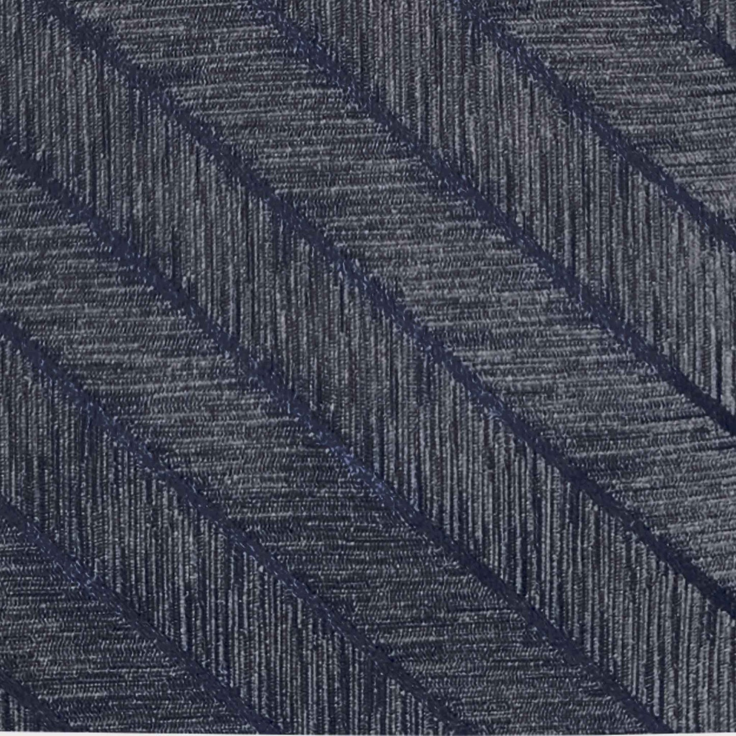 Detail of taupe brown regimental silk tie with melange texture