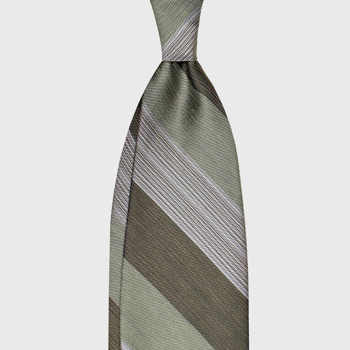 Luxury Tie Linen Silk Regimental Pistachio Green. Discover the refined elegance of this pistachio green regimental tie, unique textured finish and timeless versatility. Available at Wools Boutique Uomo Geneva.